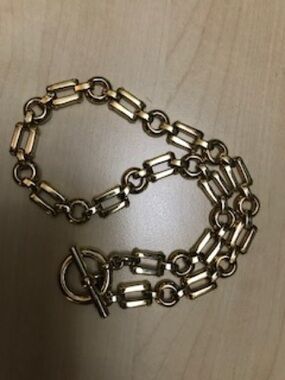 Chunky, heavy, gold tone toggle clasp necklace